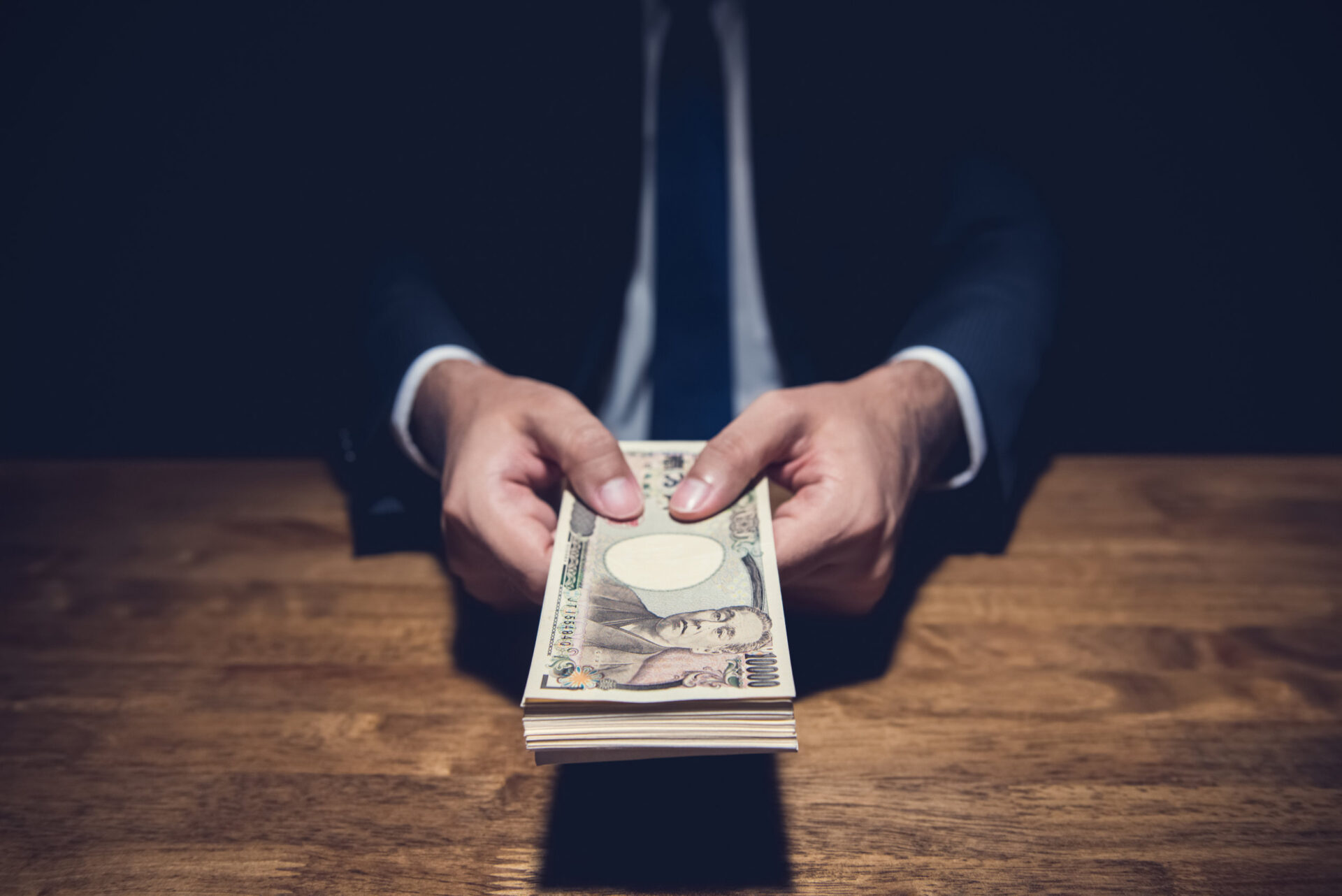 Young businessman standing in his restaurant